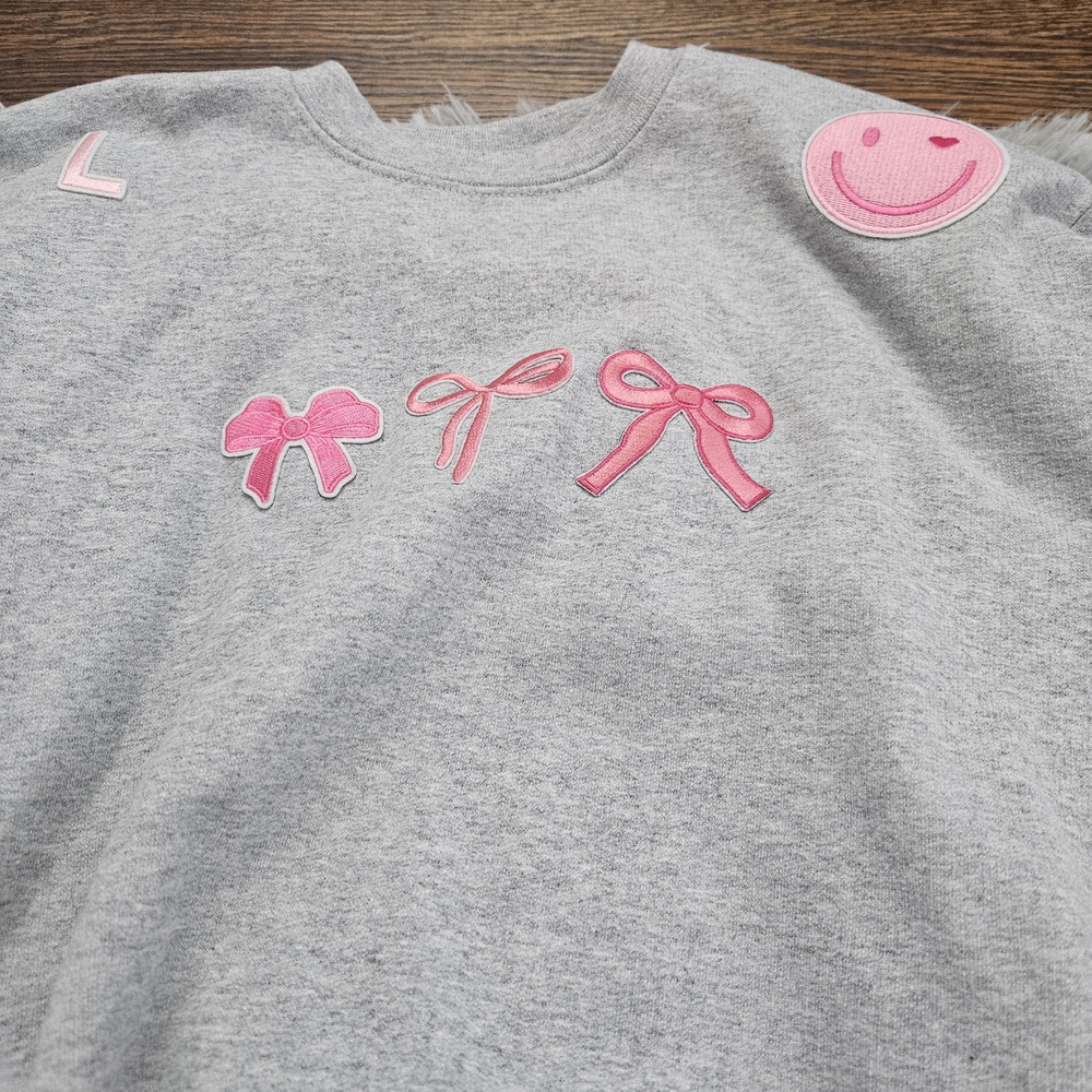 Gray Sweatshirt with Pink Bow Accents
